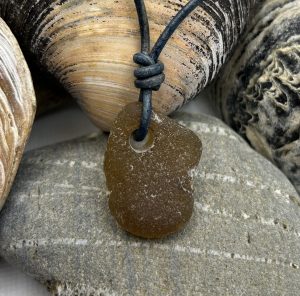 Face Shaped Brown Sea Glass Pendant