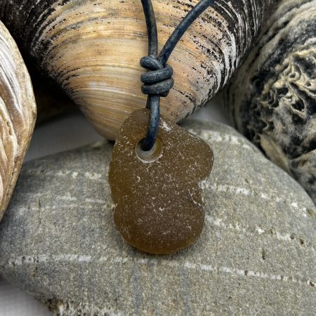 Face Shaped Brown Sea Glass Pendant